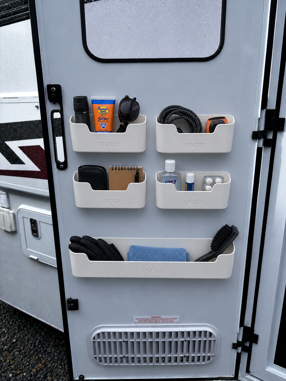 Entry door storage pockets fitted to motorhome door