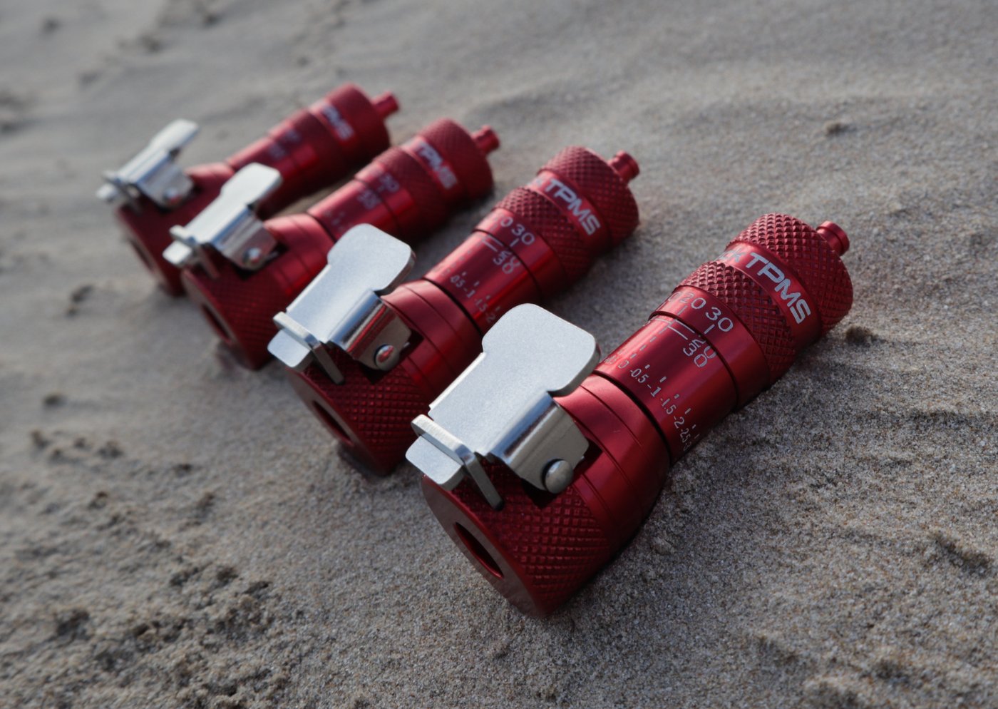 Close-up of the deflator clip mechanism and pressure scale