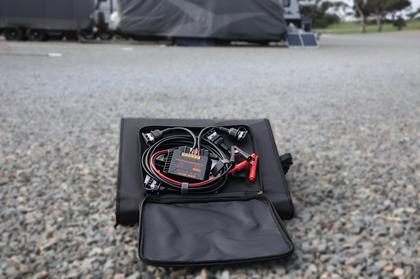 Kit contents inside the carry case's front pocket, unpacked